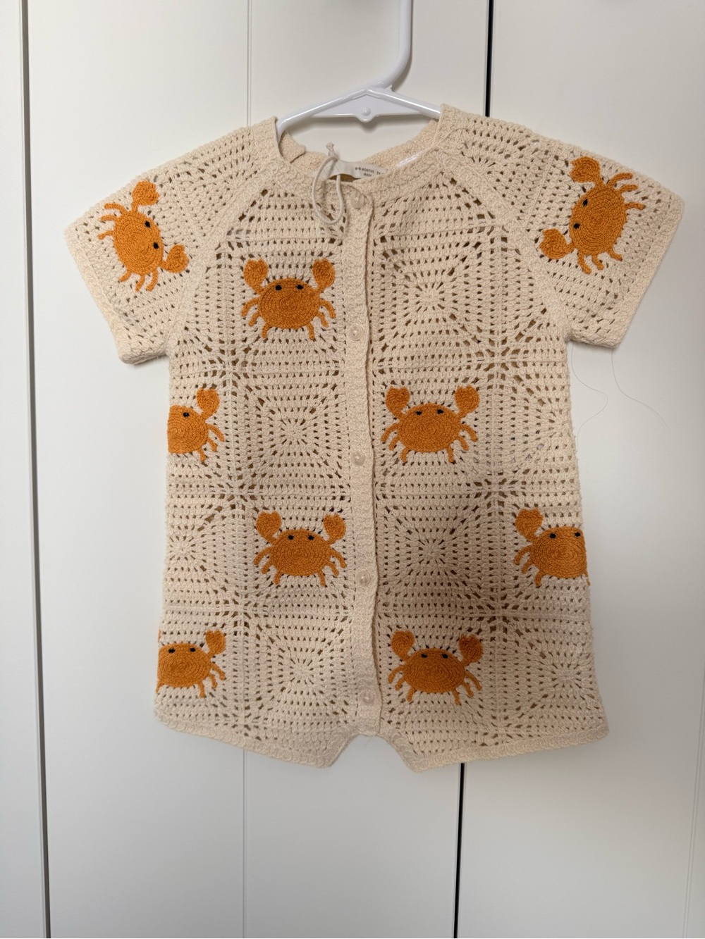 H&M Cream Crochet One-Piece with Orange Crab Appliqués